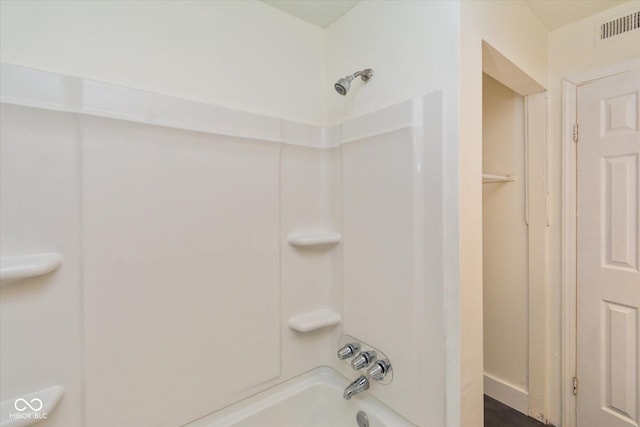 bathroom featuring visible vents and shower / bathing tub combination