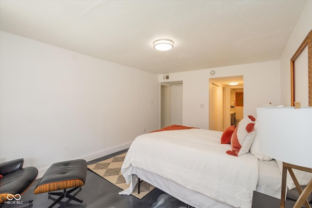 bedroom with visible vents and baseboards