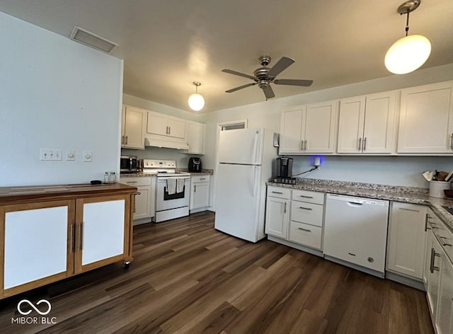 kitchen with under cabinet range hood, white appliances, dark wood-type flooring, visible vents, and white cabinetry