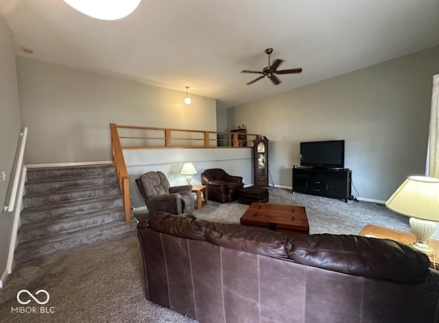 living room with lofted ceiling, carpet, stairway, and baseboards