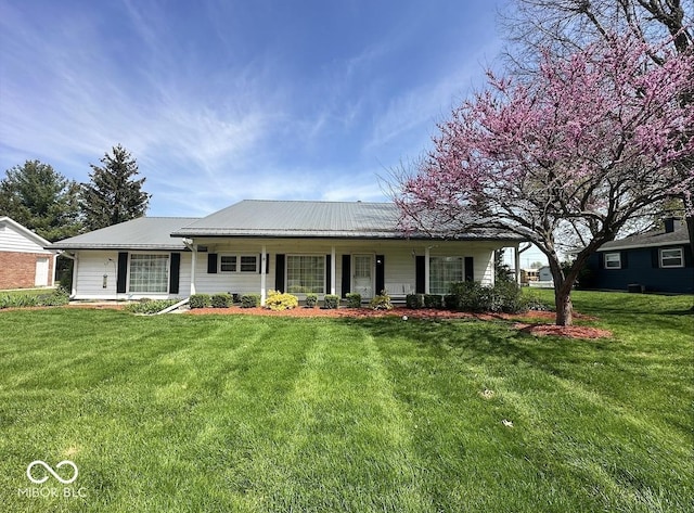 1406 Durham Dr, Crawfordsville, IN 47933 - single story home featuring covered porch, a front lawn, and metal roof