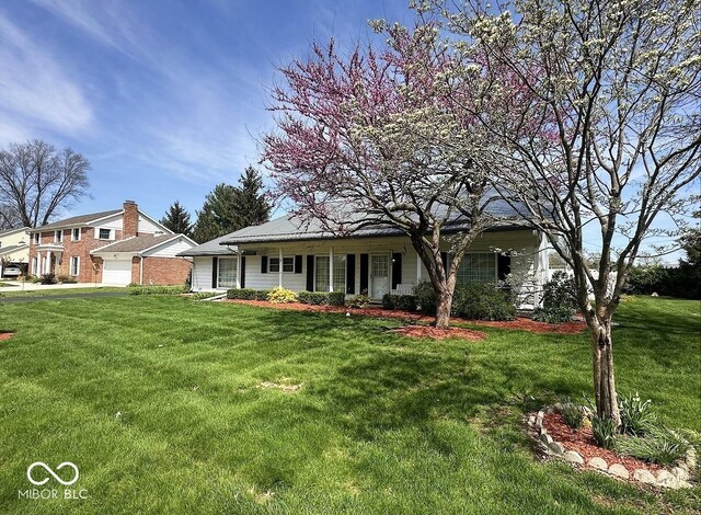 1406 Durham Dr, Crawfordsville, IN 47933 - view of front facade featuring a front yard
