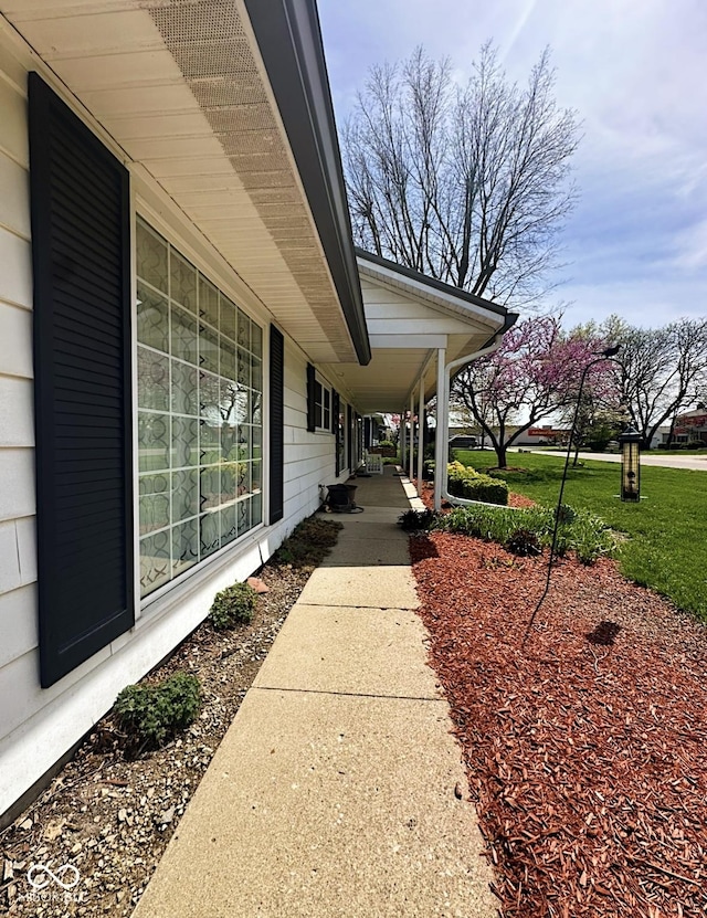1406 Durham Dr, Crawfordsville, IN 47933 - view of patio / terrace with a porch