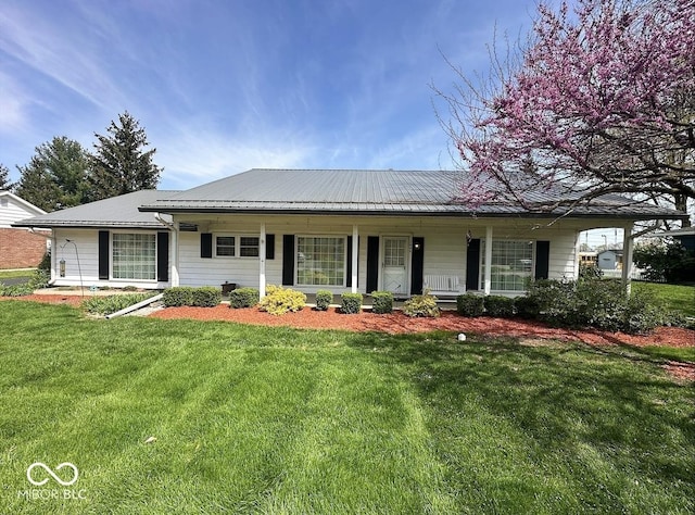 1406 Durham Dr, Crawfordsville, IN 47933 - ranch-style home with a porch and a front yard
