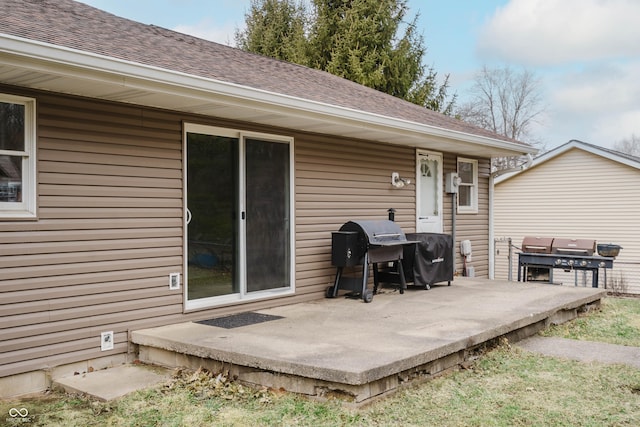 deck featuring a patio and area for grilling