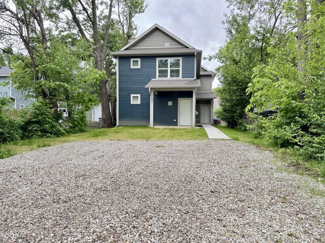 857 N Oakland Ave, Indianapolis, IN 46201 - view of front of house with driveway and a shingled roof