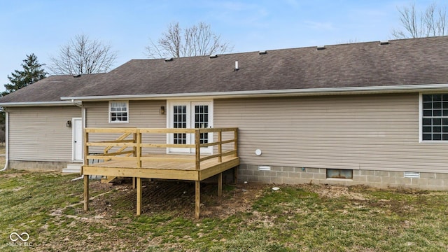 rear view of property with a shingled roof, crawl space, a yard, and a wooden deck