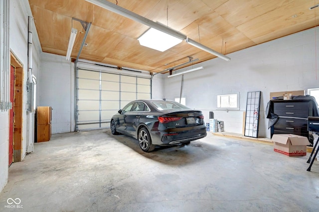 garage featuring concrete block wall