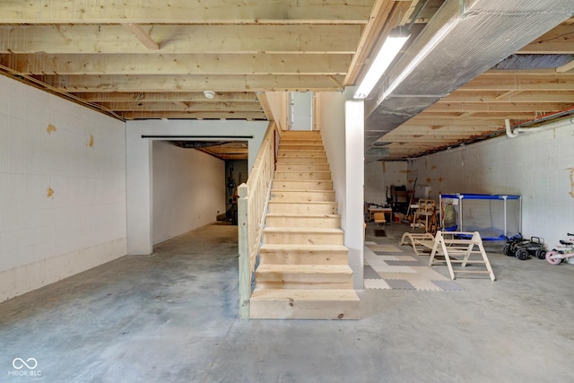 unfinished basement with stairway