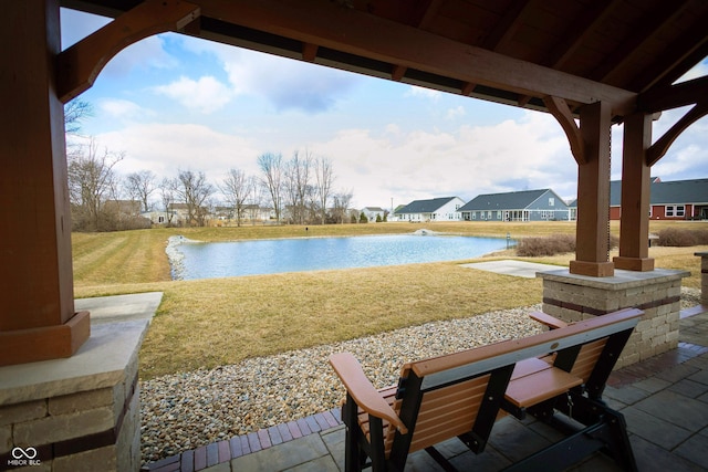 view of patio / terrace featuring a water view