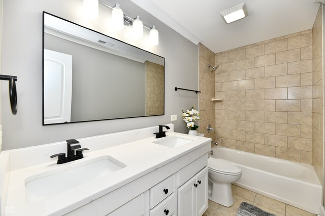 bathroom with tile patterned flooring, toilet, visible vents, and a sink