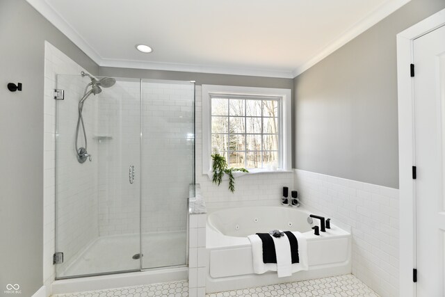 full bath with tile patterned floors, a tub with jets, a shower stall, and crown molding