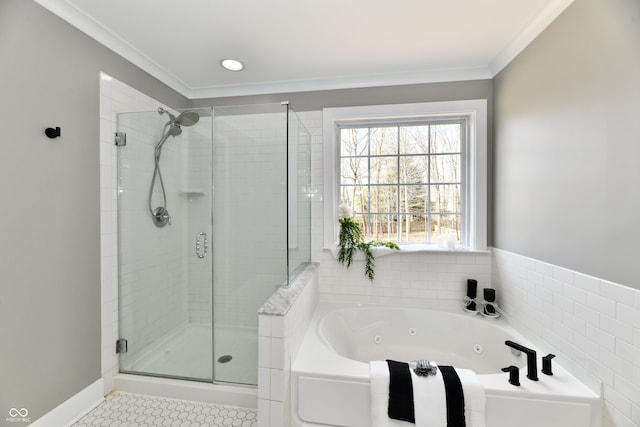 full bathroom with baseboards, a jetted tub, a stall shower, and crown molding