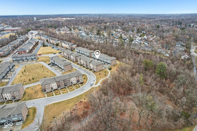 birds eye view of property with a residential view