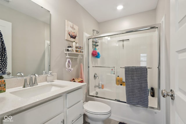 full bath with enclosed tub / shower combo, visible vents, toilet, and vanity