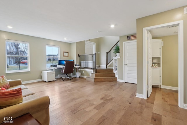 office area with recessed lighting, light wood-style flooring, and baseboards