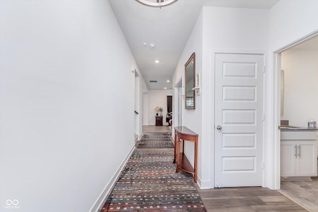 interior space featuring wood finished floors, visible vents, and recessed lighting