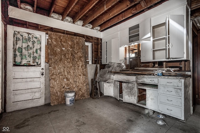 kitchen featuring white cabinetry