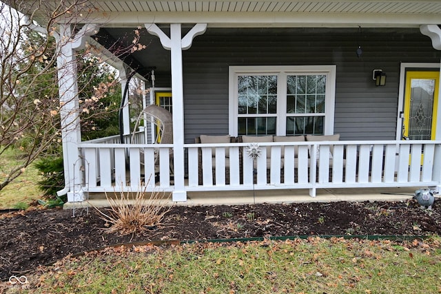 view of property exterior with a porch