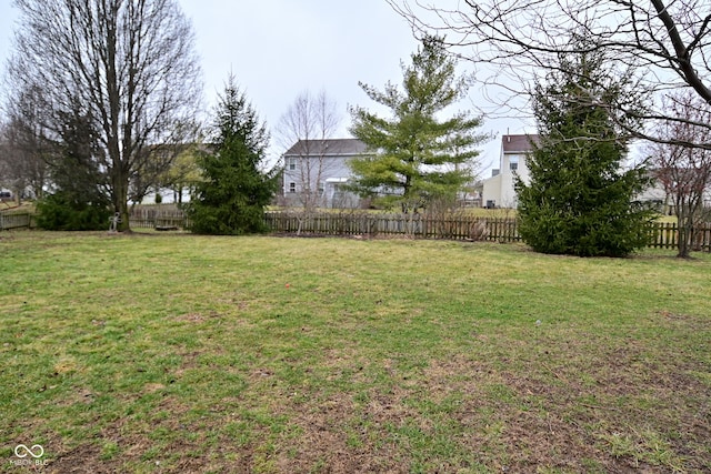 view of yard with fence