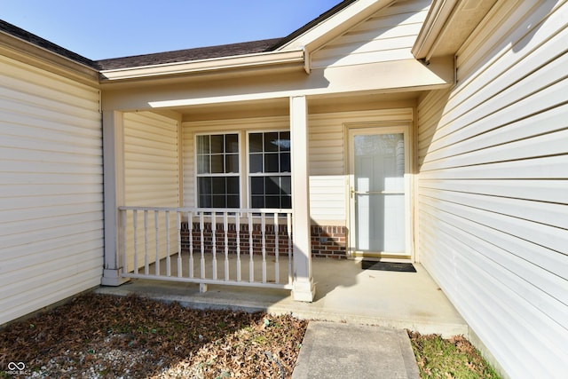 doorway to property with covered porch