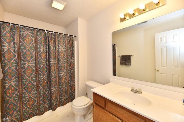 full bathroom featuring vanity, a shower with shower curtain, toilet, and visible vents