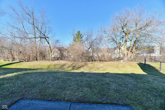 view of yard with fence