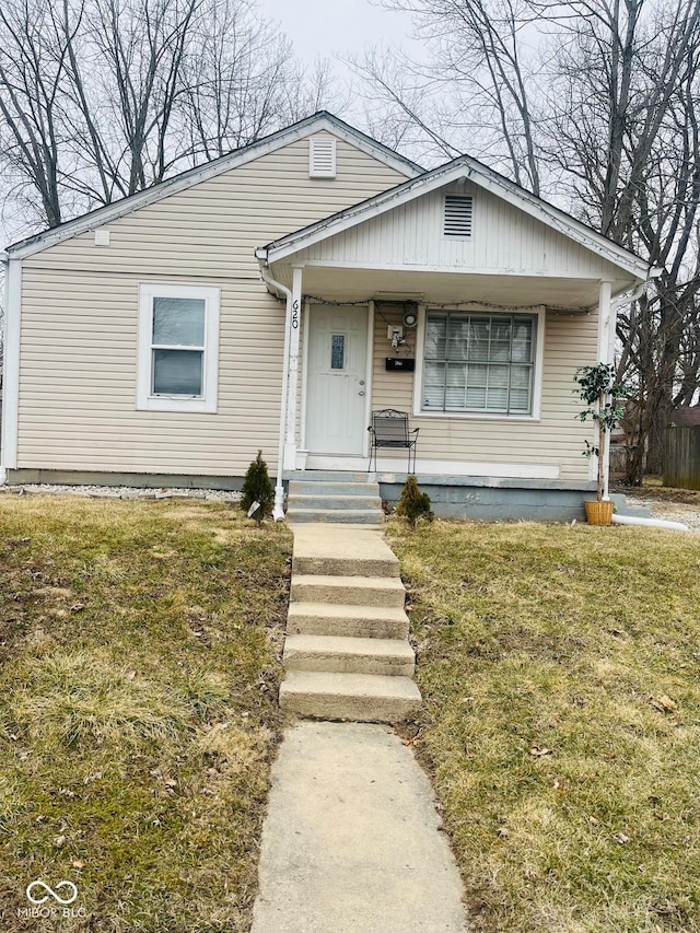 view of front of property with a front lawn