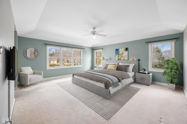 bedroom featuring lofted ceiling, carpet, a ceiling fan, and baseboards