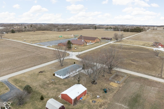 birds eye view of property featuring a rural view