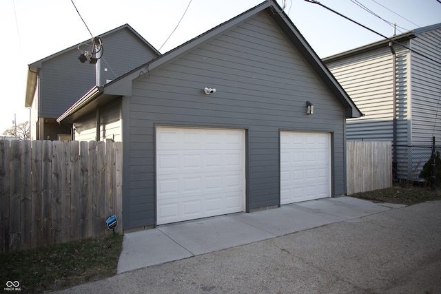 garage featuring fence