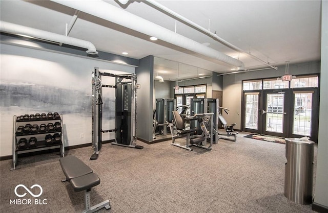 workout area with french doors, baseboards, and carpet floors