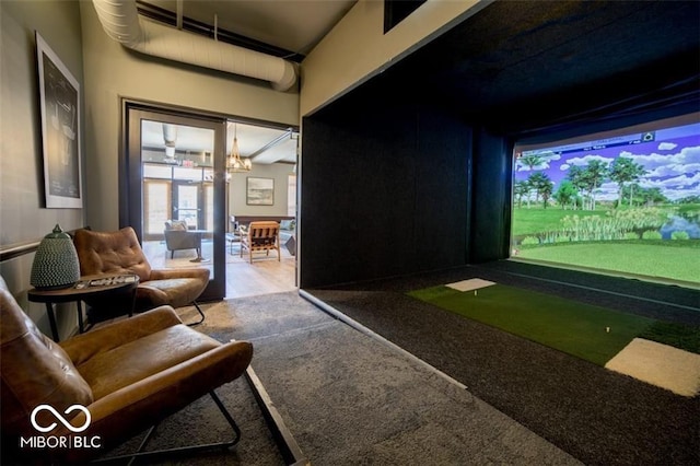 recreation room with golf simulator