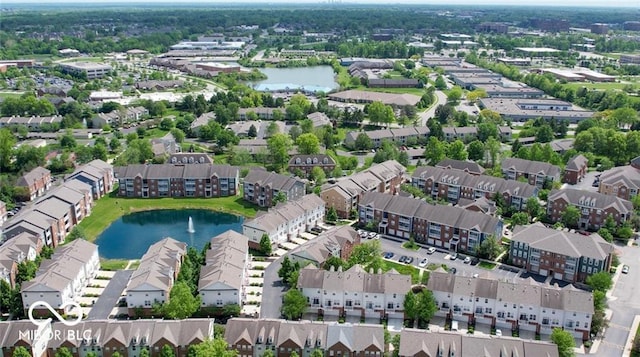 aerial view with a residential view and a water view