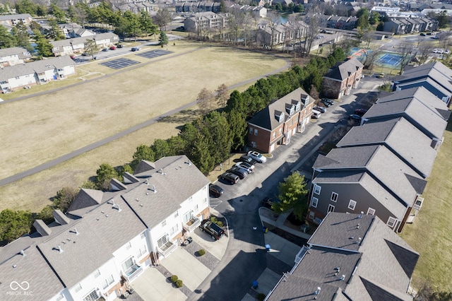 birds eye view of property with a residential view