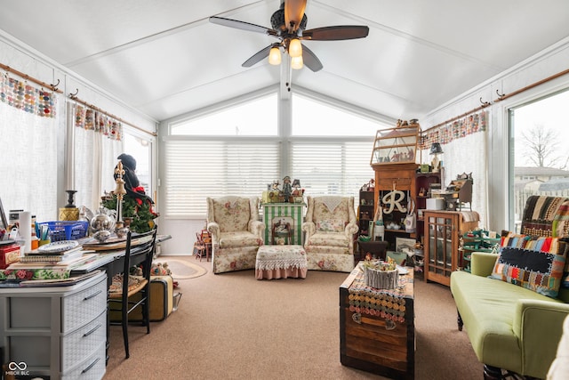 sunroom / solarium featuring lofted ceiling, ceiling fan, and a wealth of natural light