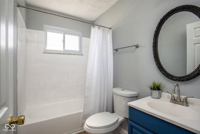 bathroom featuring vanity, toilet, and shower / bath combo