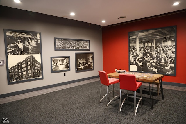 dining area with baseboards and recessed lighting