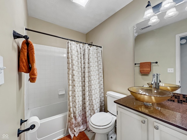 full bath with vanity, visible vents, shower / bath combination with curtain, a textured ceiling, and toilet