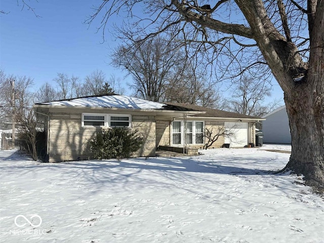 single story home with a garage