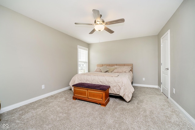 bedroom with carpet, ceiling fan, and baseboards