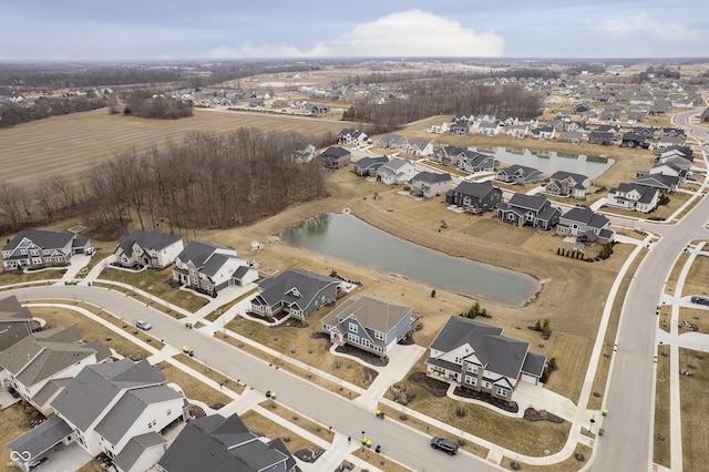 aerial view with a water view and a residential view