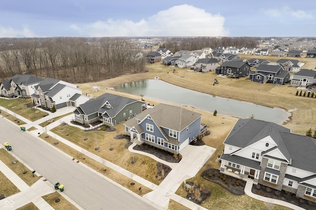 aerial view featuring a water view and a residential view