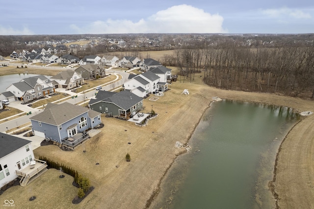 aerial view with a water view and a residential view