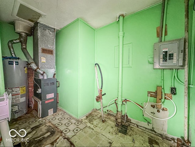 utilities featuring heating unit, electric panel, and gas water heater