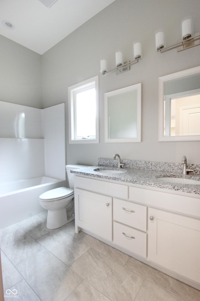 3604 Maple Ridge Dr, Columbus, IN 47201 - full bath featuring double vanity and toilet