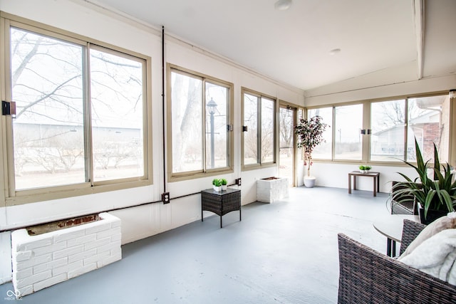 sunroom with lofted ceiling