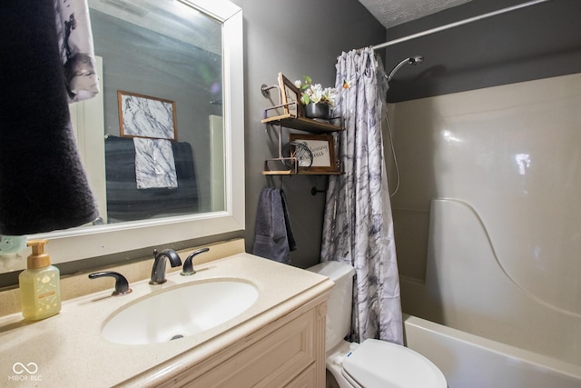 full bathroom with toilet, shower / bath combination with curtain, and vanity