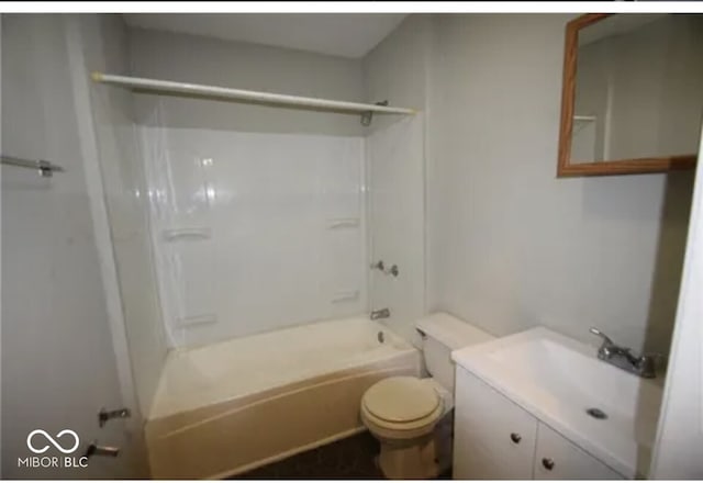 bathroom featuring shower / bath combination, vanity, and toilet