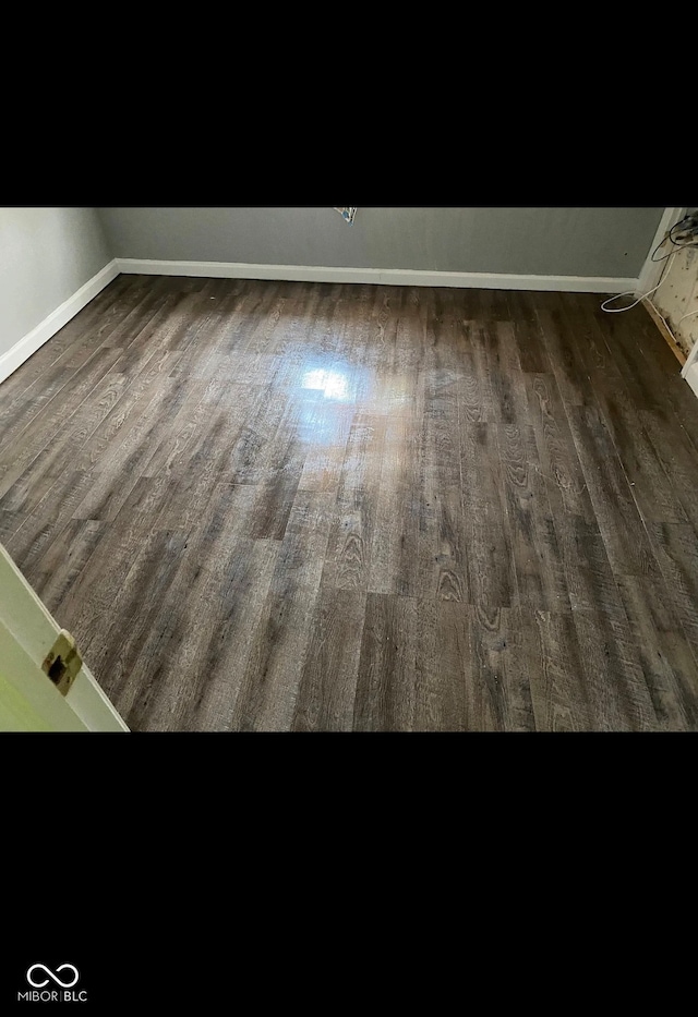 room details with wood finished floors and baseboards